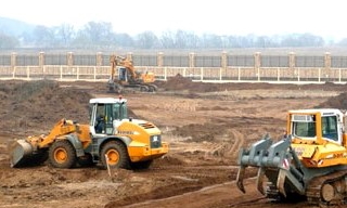 Планировка участка бульдозером в Инте от 919 руб. Цены за м2 - 2Землекопа-Инт